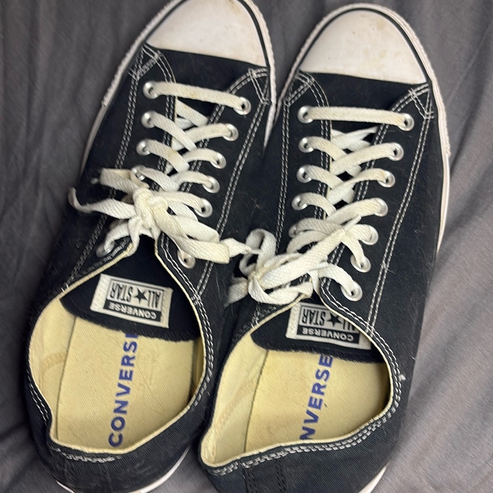 Never worn men converse in13 will fit a 12 with thick socks. Christmas present.!